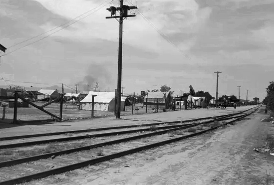 Tents set up near the railroad tracks near Phoenix as seen in May 1940.
