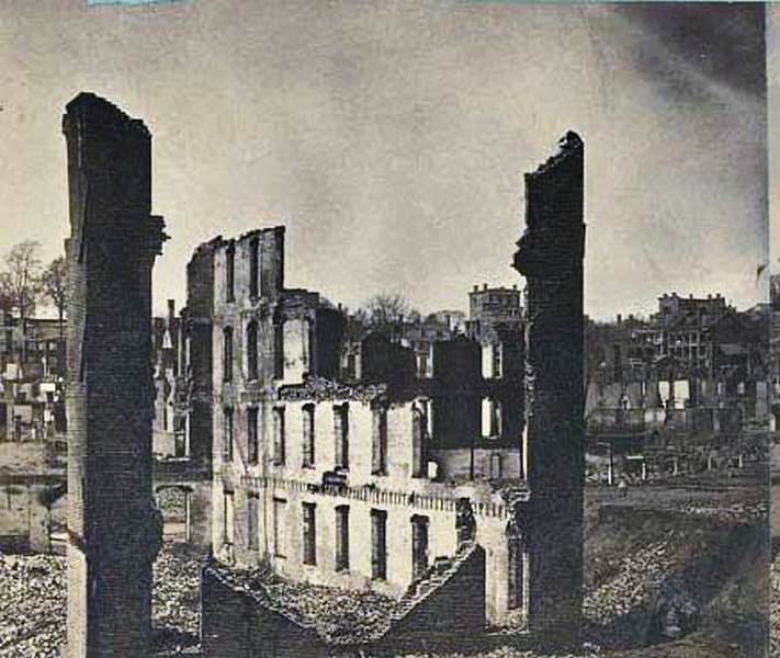 View from the Petersburgh railroad Depot, Richmond, Va., looking south-west, showing a portion of the burnt district, and Gamble Hill in the distance, 1865.