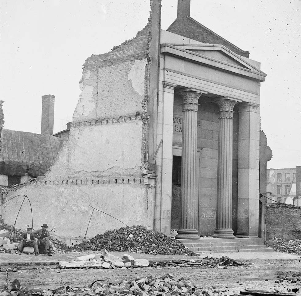Ruins of the Exchange Bank (Main Street) with the facade nearly intact, 1865
