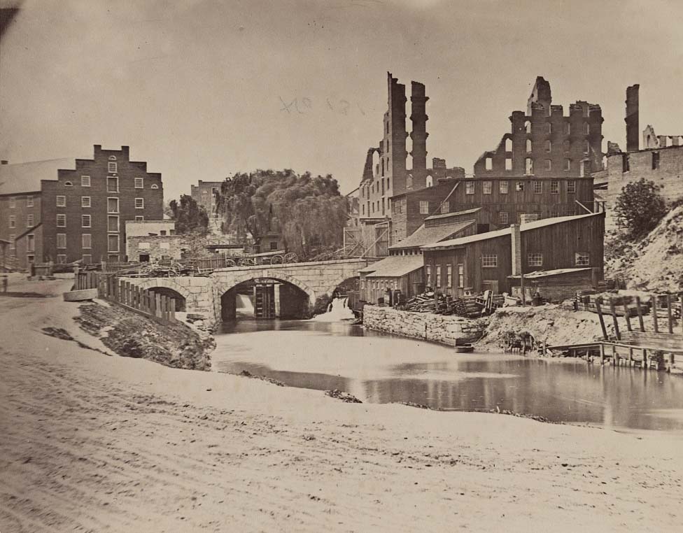 James River and Kanawha Canal near the Haxall Flour Mills, and ruins of Gallego Mills in the distance, 1863