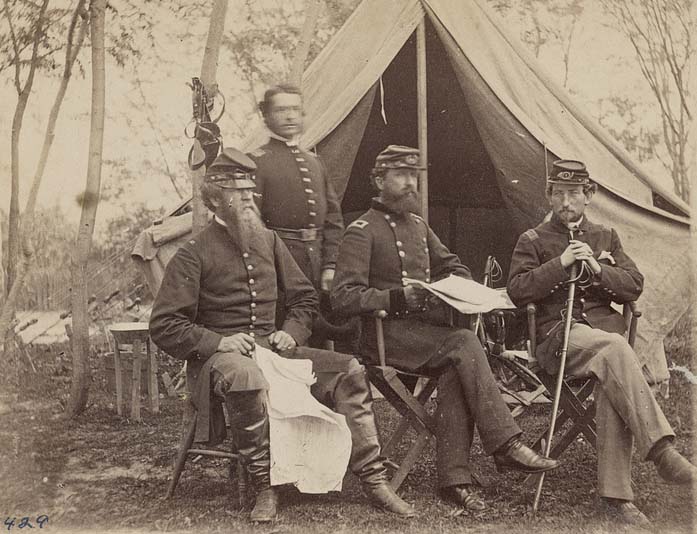 Group portrait of General George Sykes and his staff in front of a tent, 1862