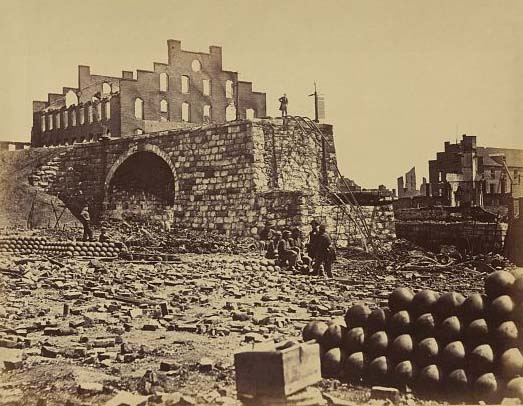 The ruins of the Richmond and Petersburg railroad bridge in the yard where the Confederate artillery was manufactured, 1863