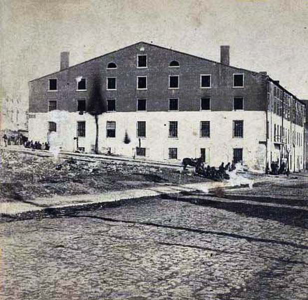 An exterior view of the site of the Confederate military prison, 1861
