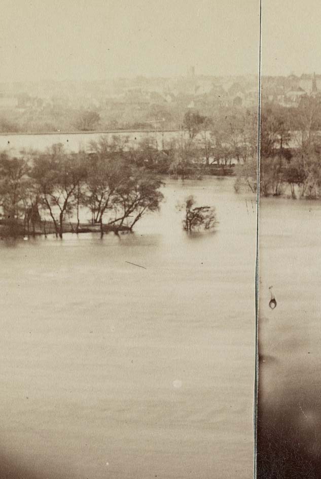 A city in the distance across the river, Richmond, 1863