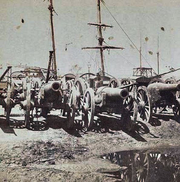 Captured Confederate cannons at Rocketts Landing in Richmond in the process of being shipped to Fort Monroe, 1865