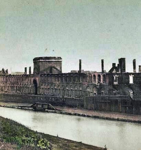 The ruins of the former Virginia State Armory along the canal in Richmond, Virginia after the Confederates abandoned the city, 1865