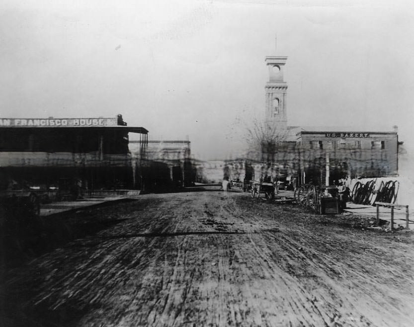 Street scenes of businesses on K Street from 9th Street looking west in 1860. St. Rose of Lima Church is on the right.