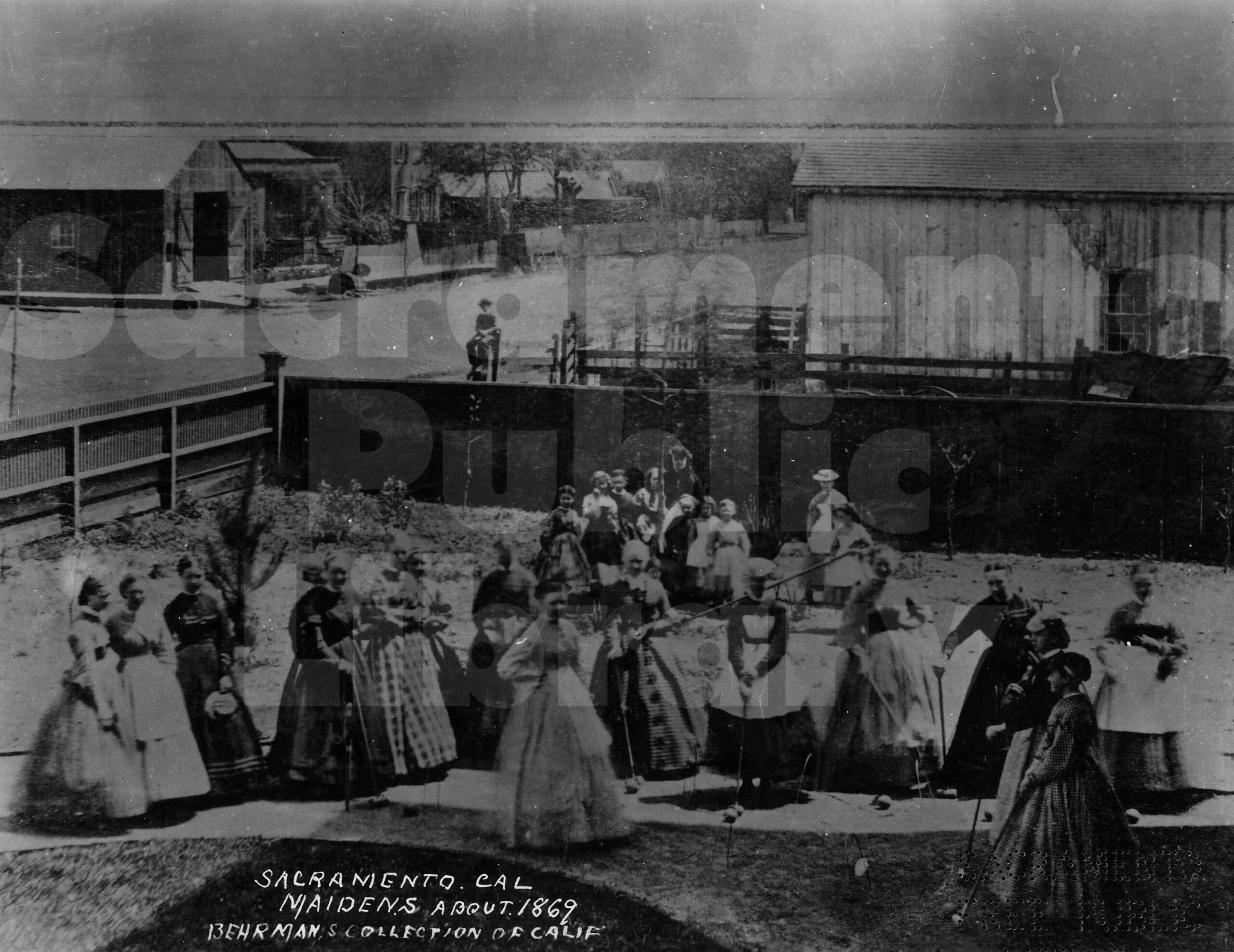 Group of young Sacramento women playing croquet, 1867.