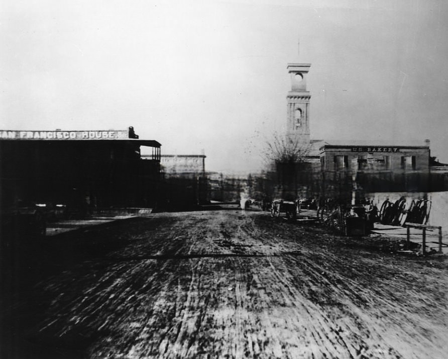 An elevated view looking west on K Street from 7th Street is Street, 1869. Rose of Lima Catholic Church.