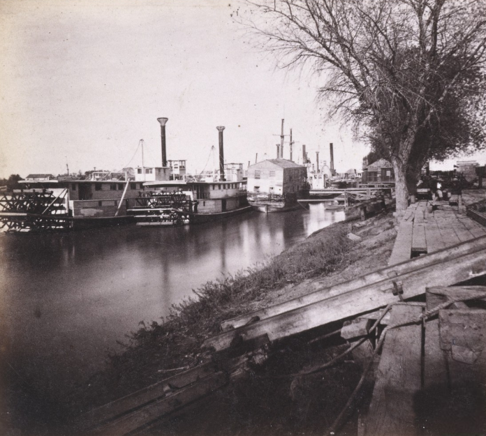 1063. The Levee and Steamers at Sacramento City, 1860s