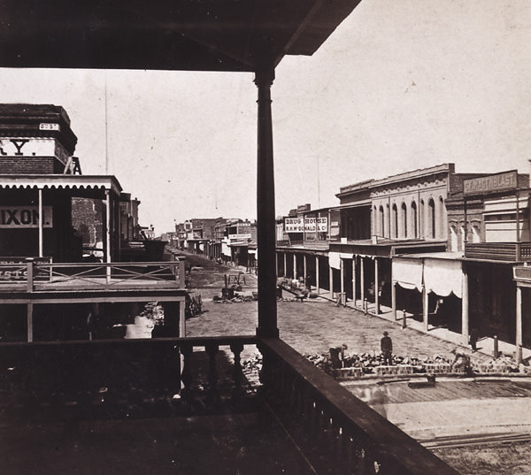 Sacramento. J Street, from Sixth Street. Laying the Nicolson Pavement, 1860s