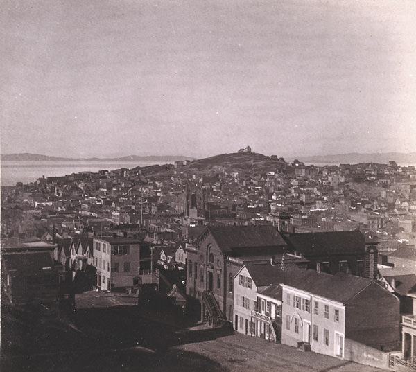 Telegraph Hill from corner Sacramento and Powell streets, 1860s