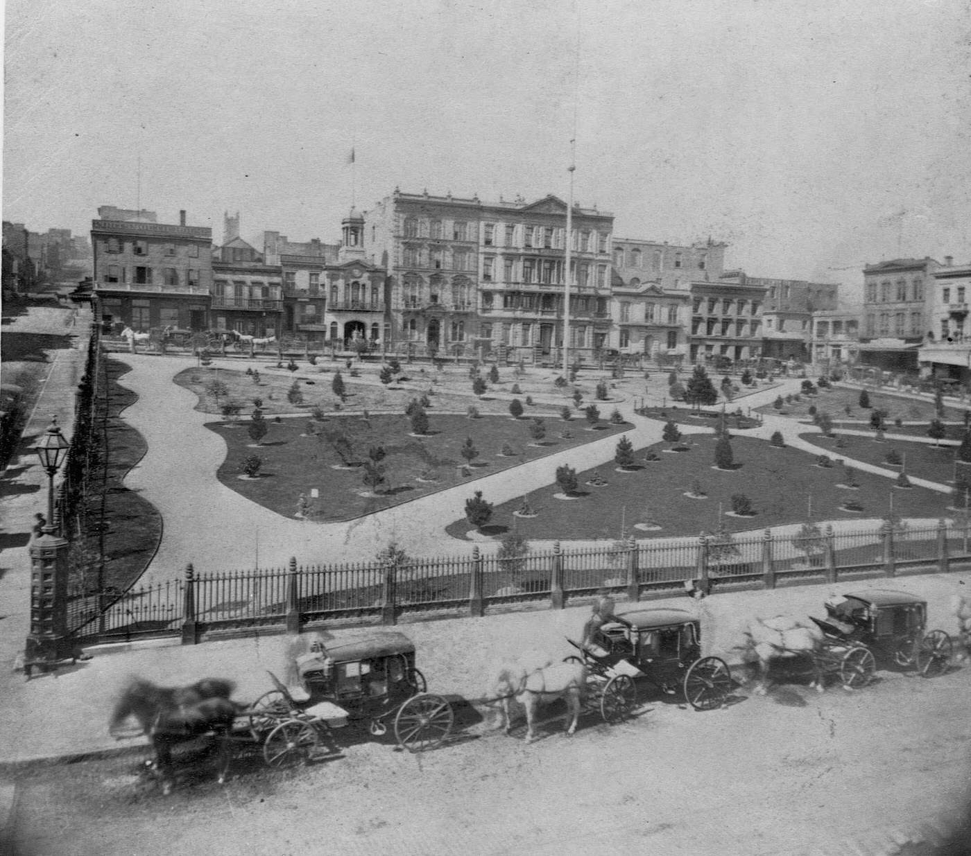 Carriages line the streets bordering Portsmouth Plaza, San Francisco's first town square and the hub of city until the 1850s