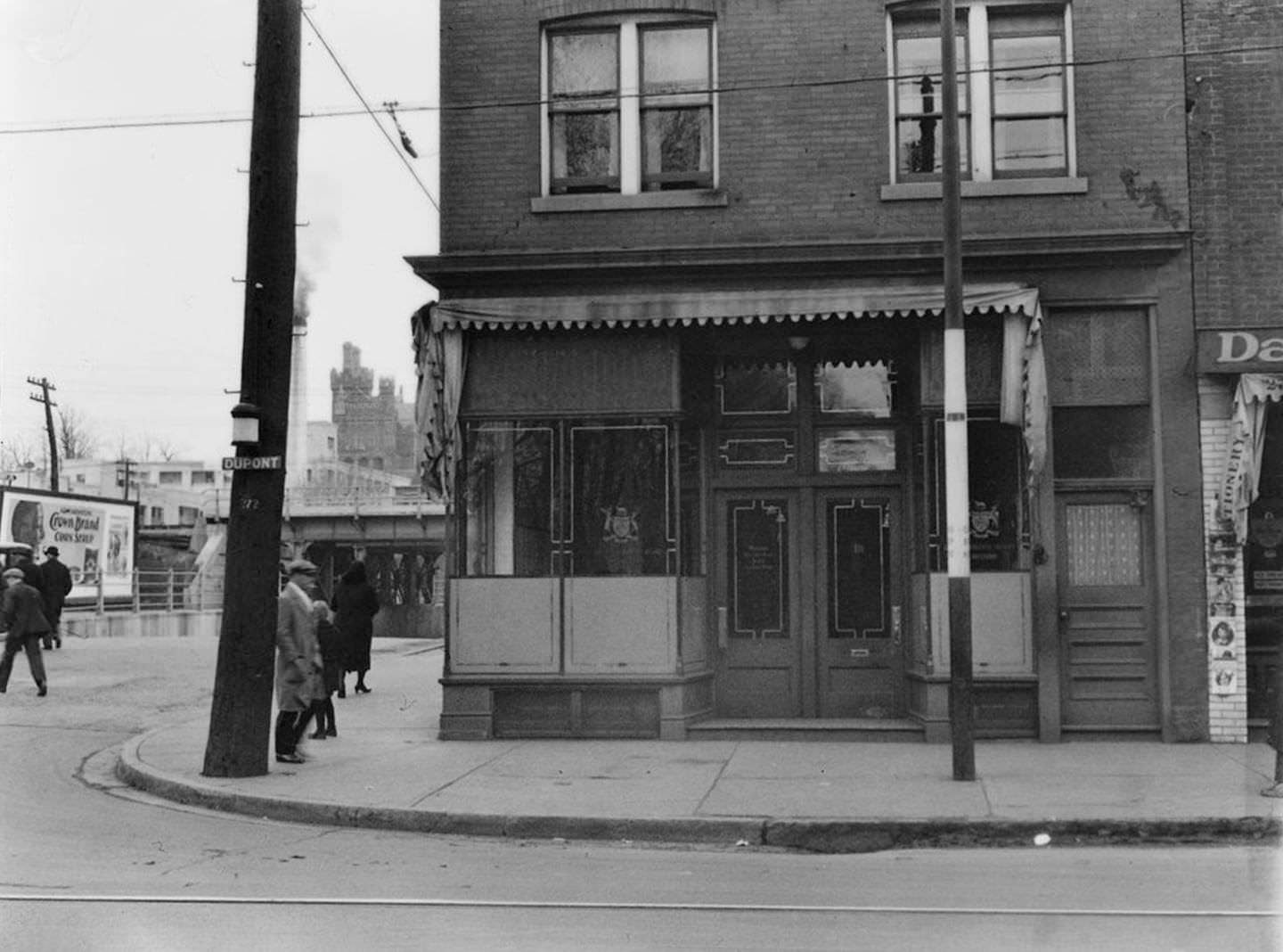 LCBO Liquor store, northeast corner of Dupont St. and Spadina Rd., March 18, 1930.