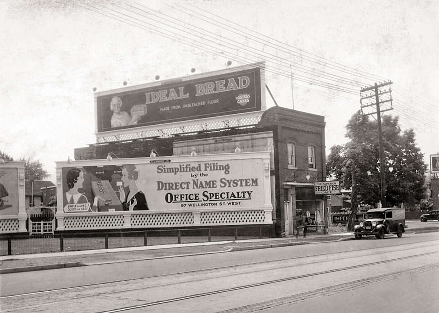 Looking south east to The Superior Fried Fish Café, 1887 Yonge Street, 1930