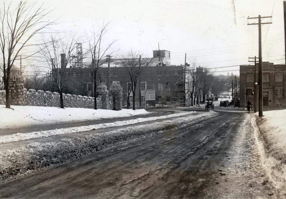 Construction site of a new plant for Barker's Bread Limited, on the south side of Davenport Road, opposite Casa Loma at Kendal. View is looking south on Walmer towards Davenport Road. Now part of George Brown, 1930