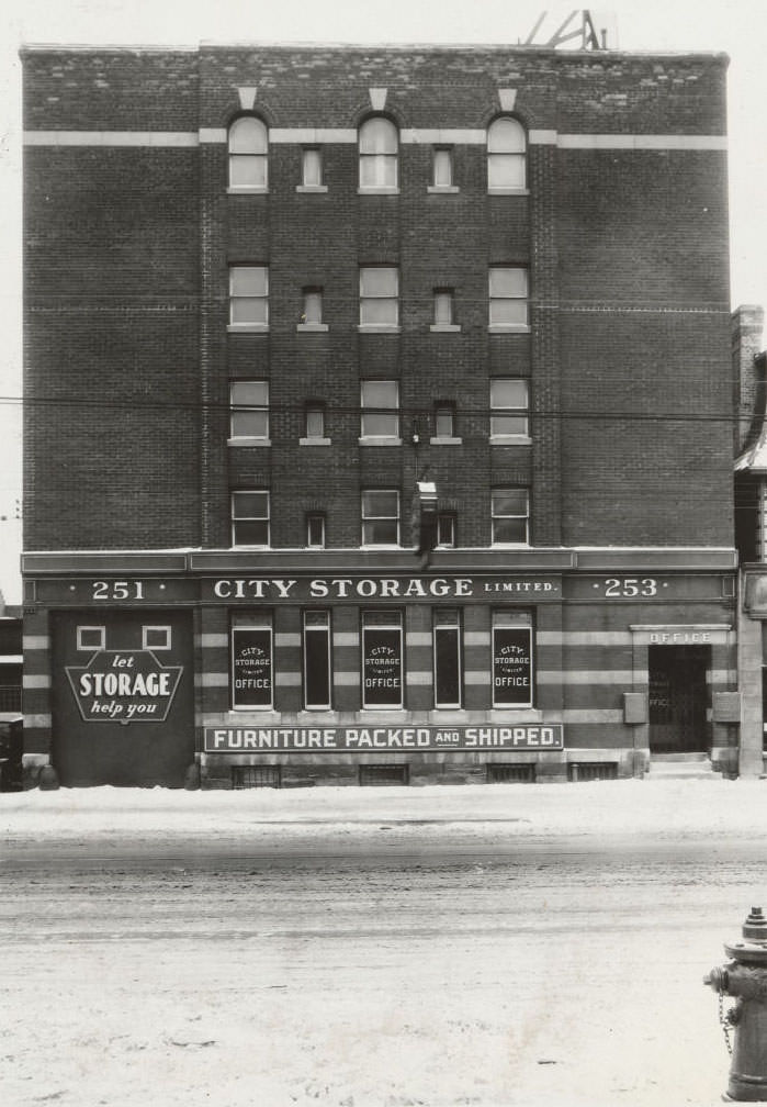 251-253 College Street. This building was a storage locker place in 1930 right up until it was torn down in 2015