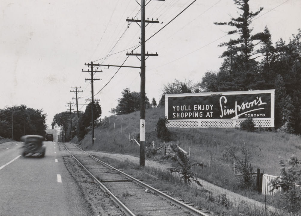 Stop 3 is listed as Sweeney's Side Road. This view is looking south on Yonge St. to Hogg's Hollow, 1936