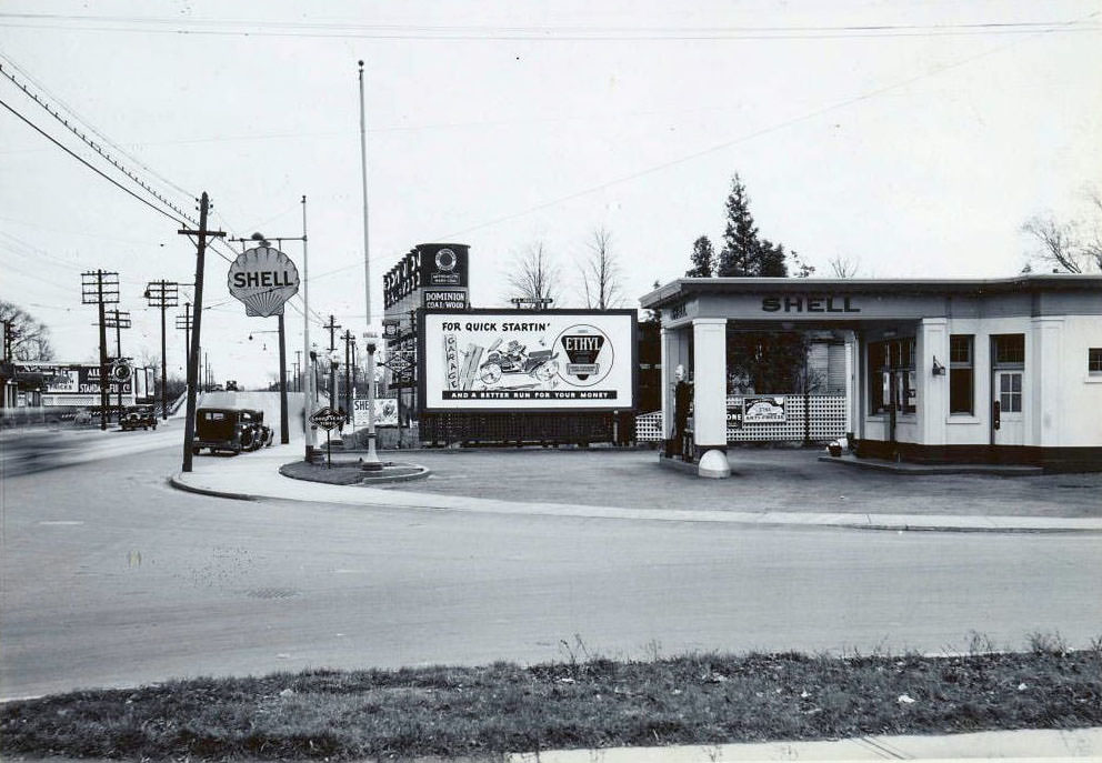 Service station adjacent to the Dominion Coal and Wood silos on Mount Pleasant Road, at Merton Street looking south, 1937