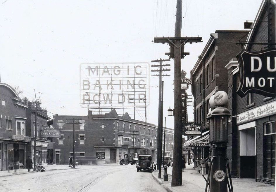 Magic Baking Powder - Electric sign, located atop a building at the south-west corner of College and Grace streets, 1937
