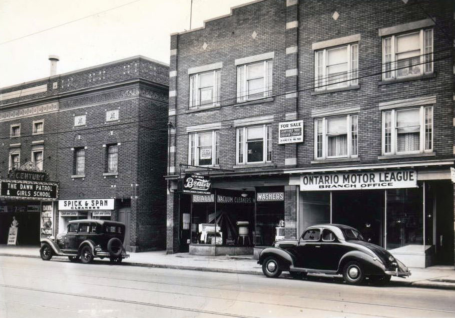 145 Danforth Avenue. The Century Theatre can be seen at the left of the image adjacent to a Spick & Span Cleaners location, 1939