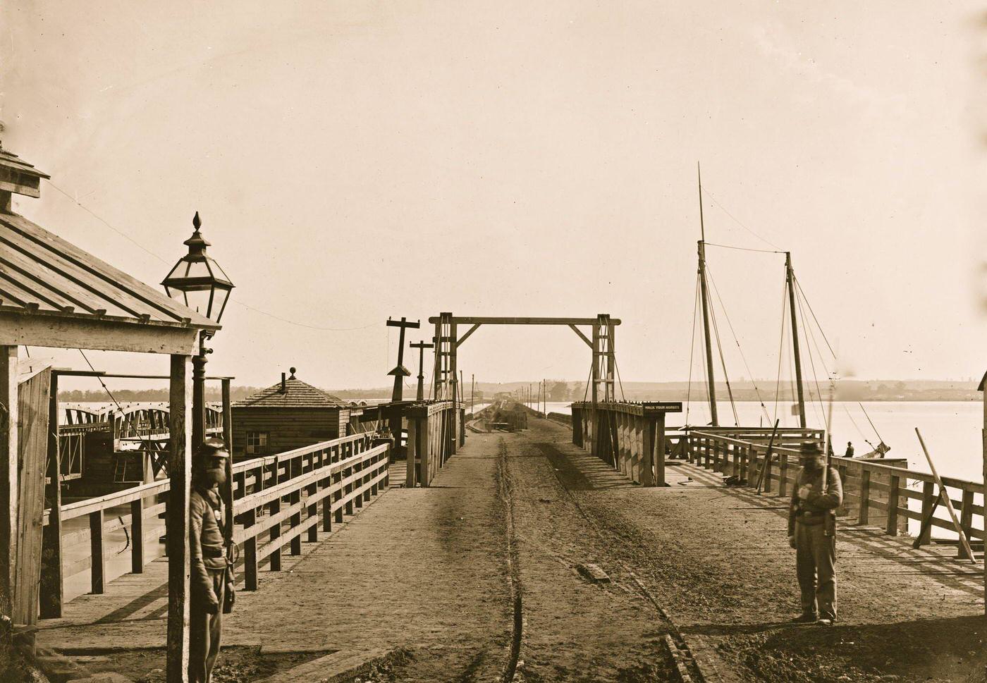 Washington, D.C. The Long Bridge over the Potomac seen from the city, 1865