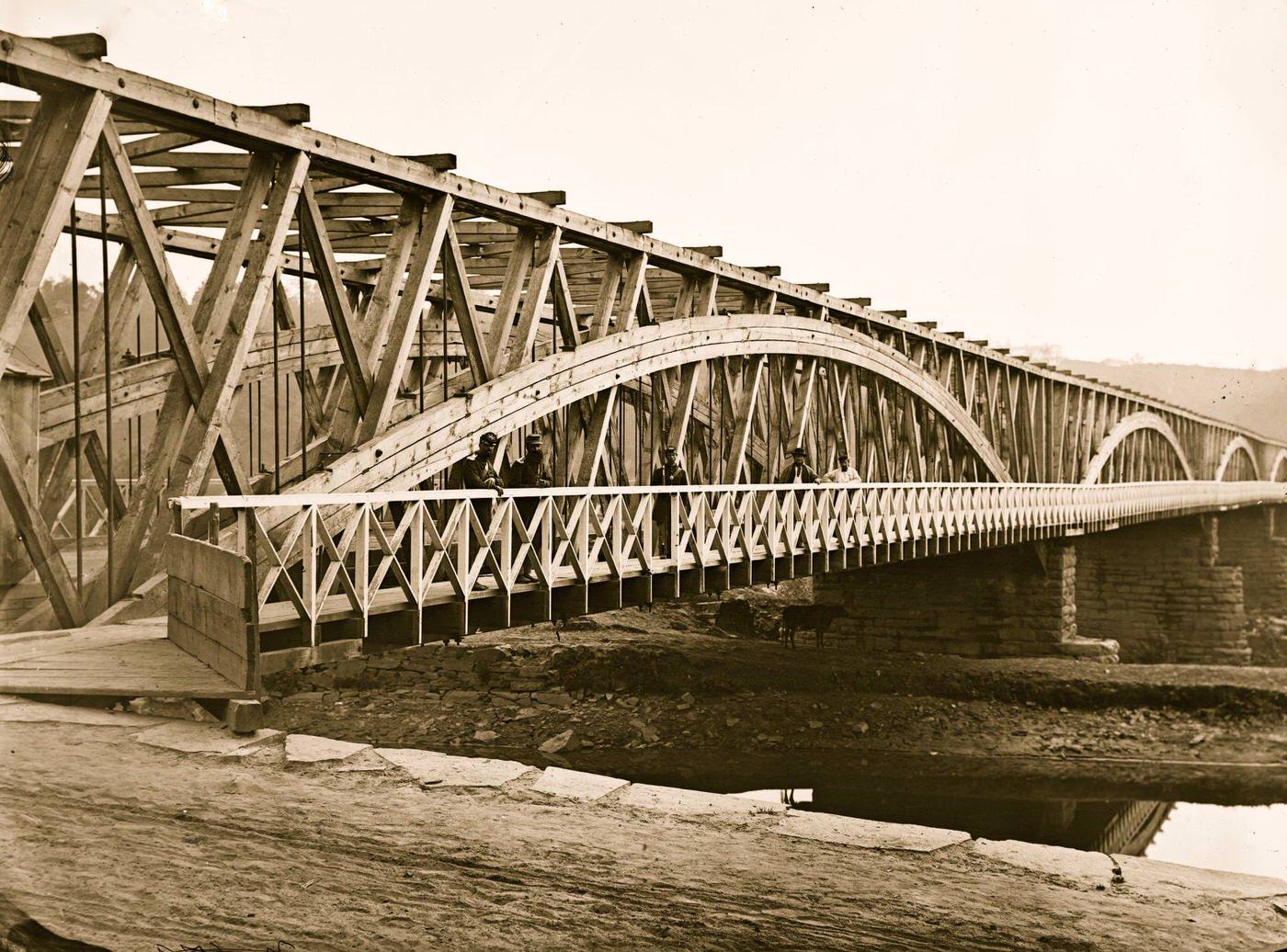 Washington, D.C. Chain Bridge over the Potomac; Chesapeake and Ohio Canal in foreground, 1865