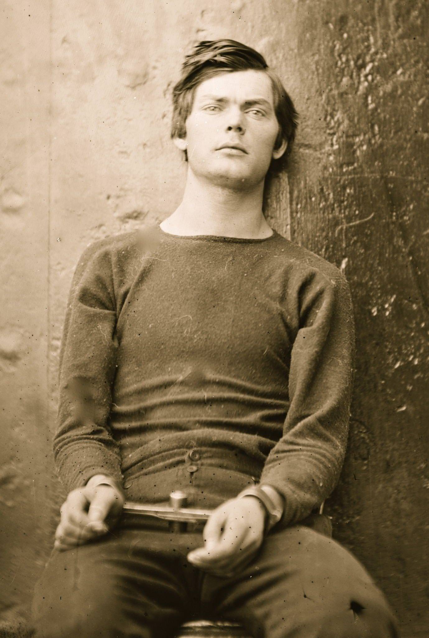 Lewis Payne in sweater, seated and manacled, Washington, D.C., 1865