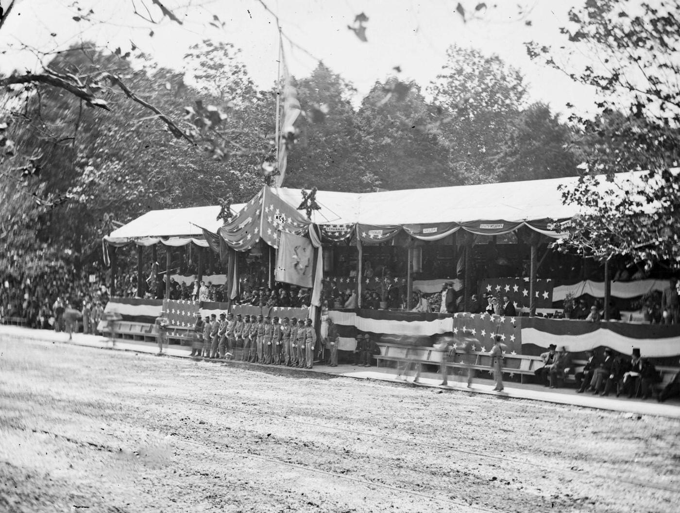 The Presidential reviewing stand, with guests and guard, during the "grand review" of the Union Army, Washington, D.C., 1865