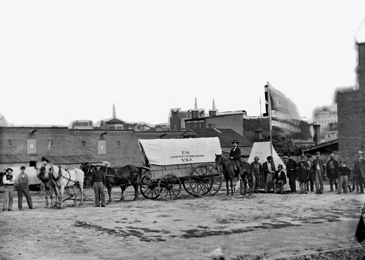 Field relief wagons and workers of the US Sanitary Commission, Washington, D.C., 1865