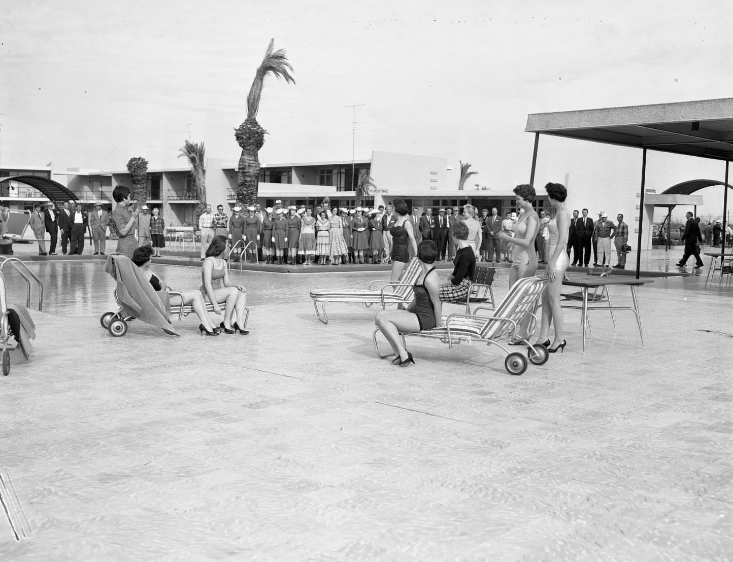 Women and Crowd by Swimming Pool, 1956