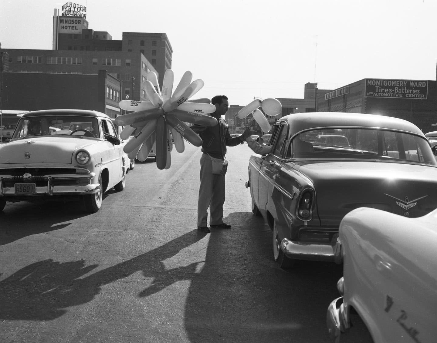 A young man helping with a polio drive in downtown Abilene, 1955