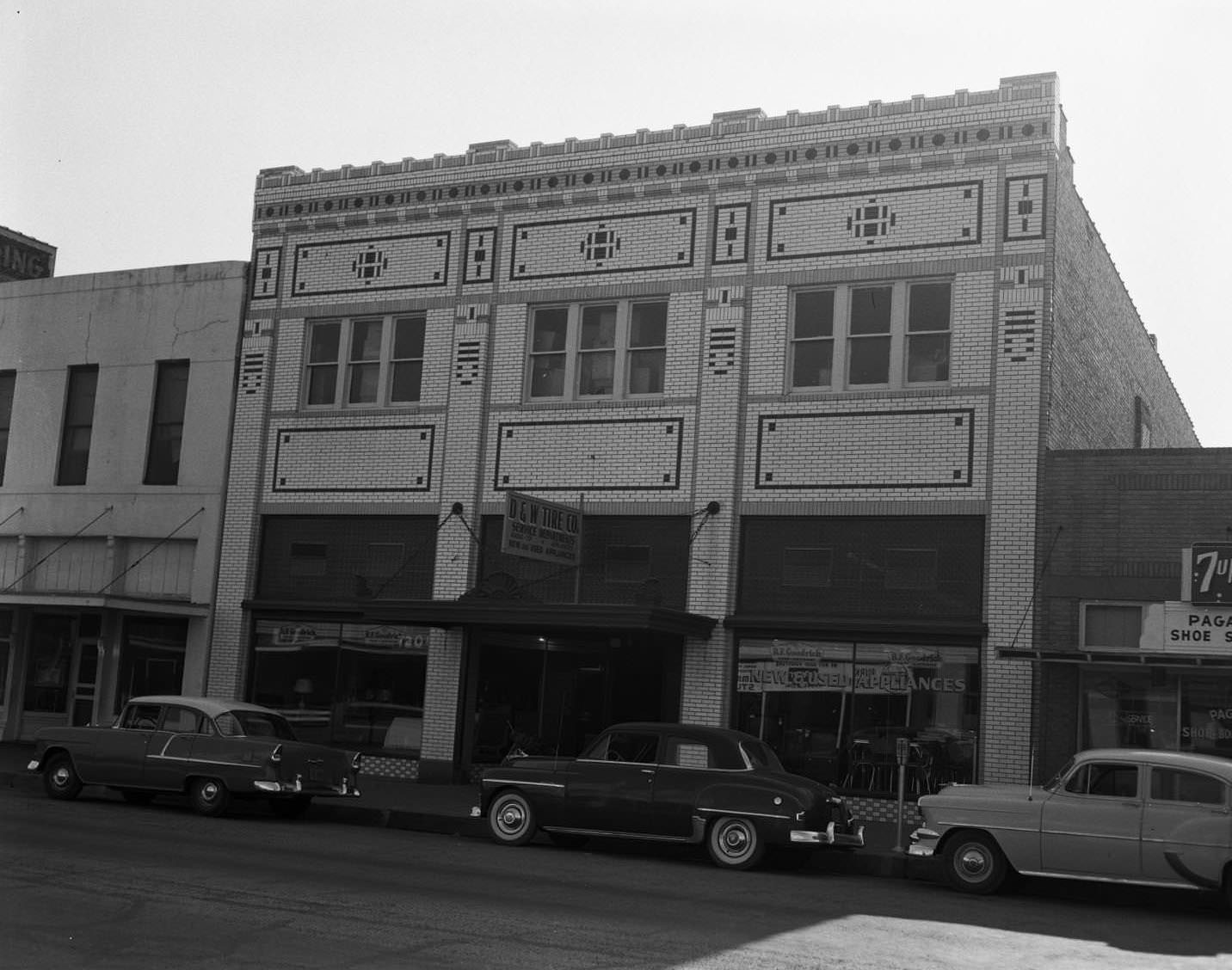 The D and W Tire Company on S. 1st and Elm St. in Abilene, Texas, 1956