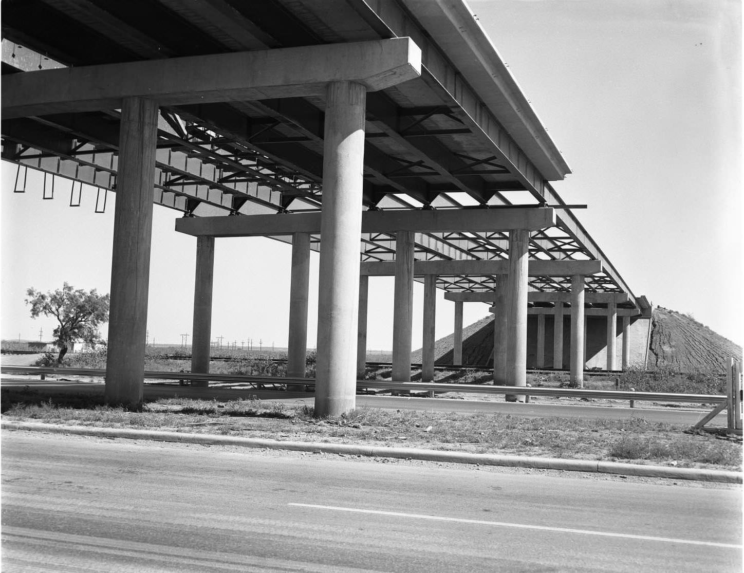 A partially constructed overpass at Highway 80 and S. 1st St. in Abilene, 1958
