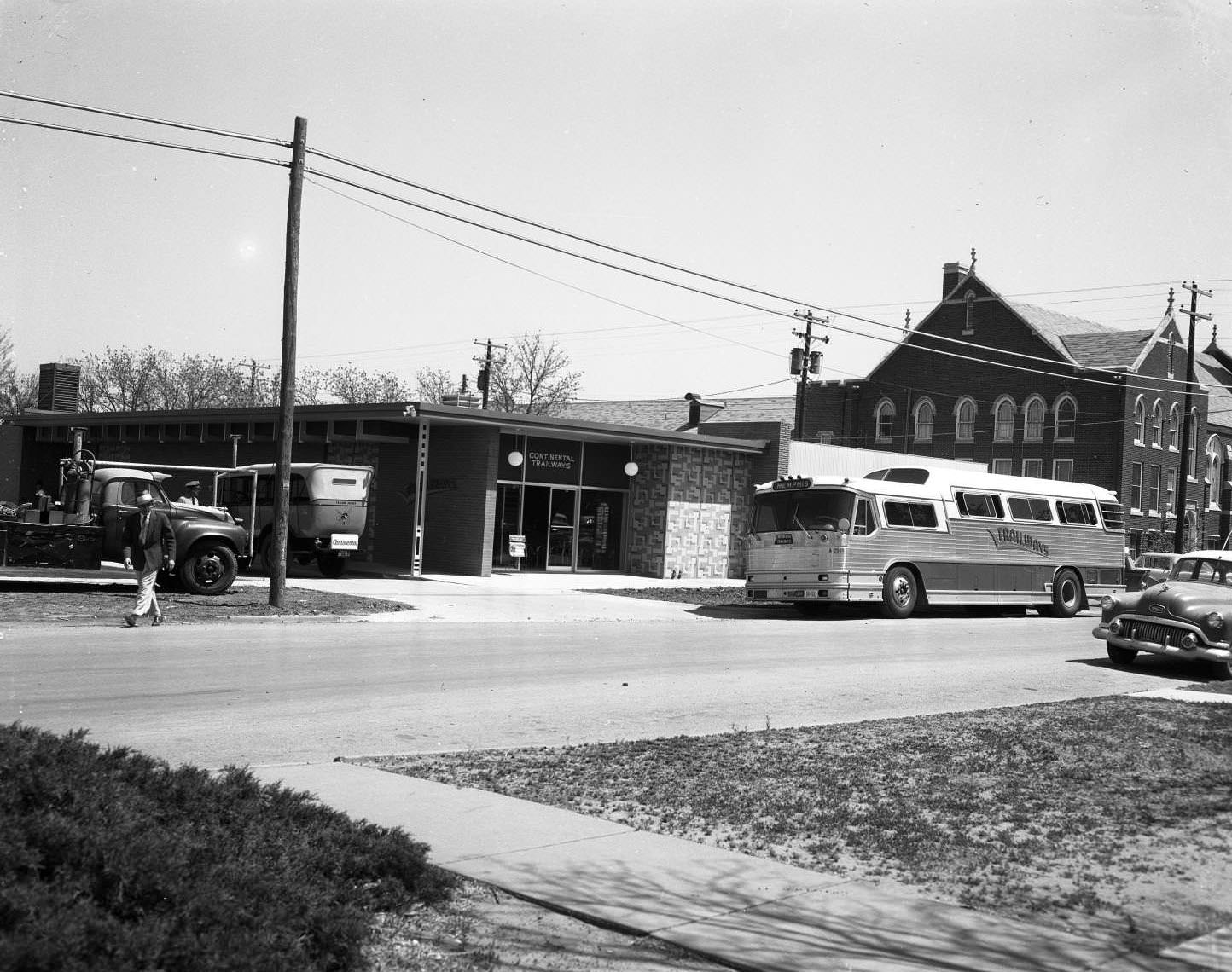 A Trailways bus in front of a Continental Trailways building, 1955