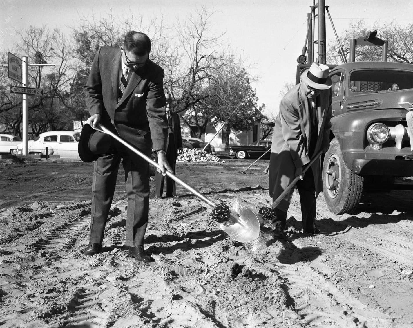 Three men during a ground breaking for the Abilene Chamber of Commerce, 1955