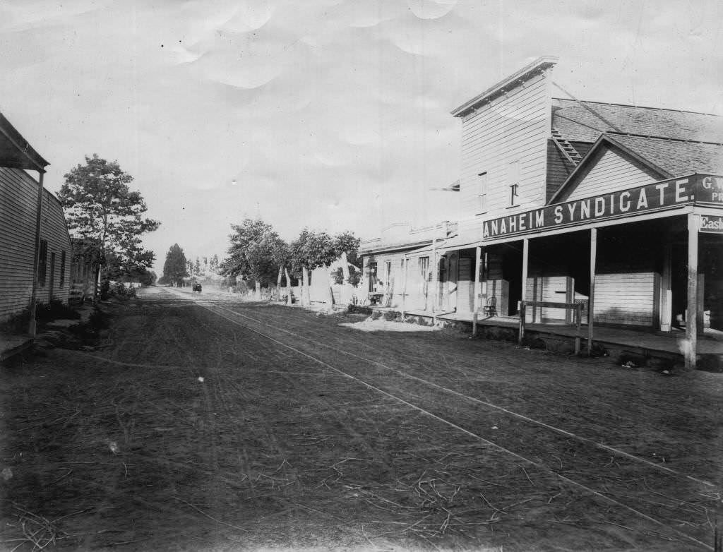 View of Center Street (now Lincoln Ave.), with Anaheim Syndicate, located near the Southern Pacific Depot on West Center St., 1888