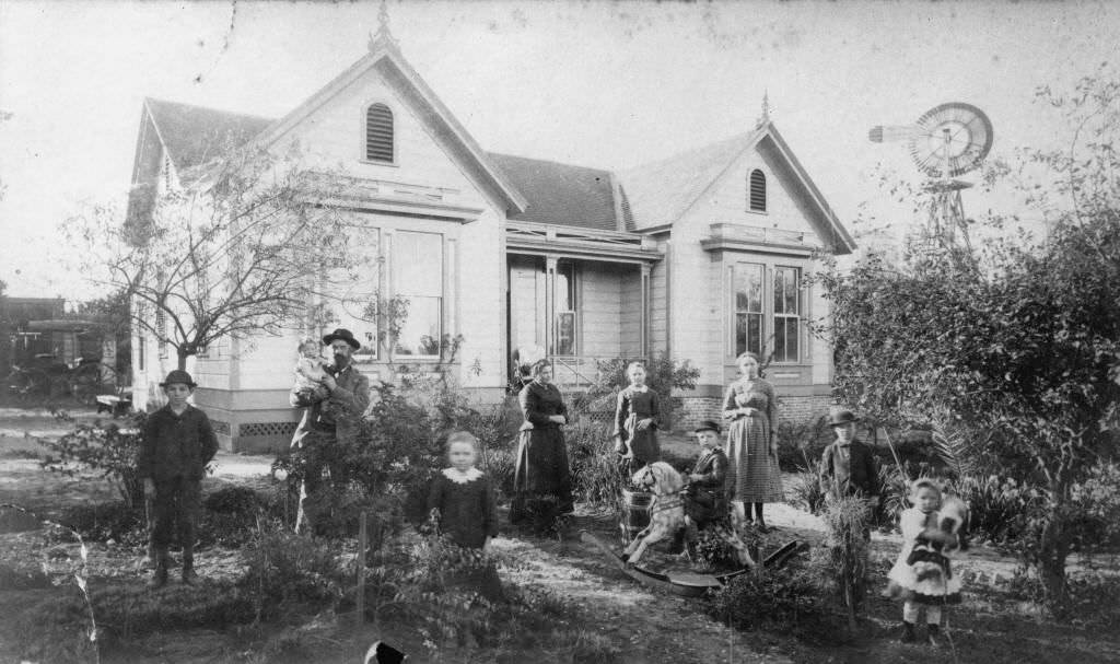 Timm Boege family standing in front of their residence, located at 1006 West Center Street (now Lincoln Ave.), Anaheim, 1887