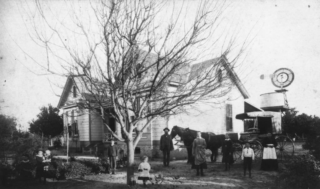Timm Boege family standing in front of their residence, located at 1006 West Center Street (now Lincoln Ave.), Anaheim, 1887