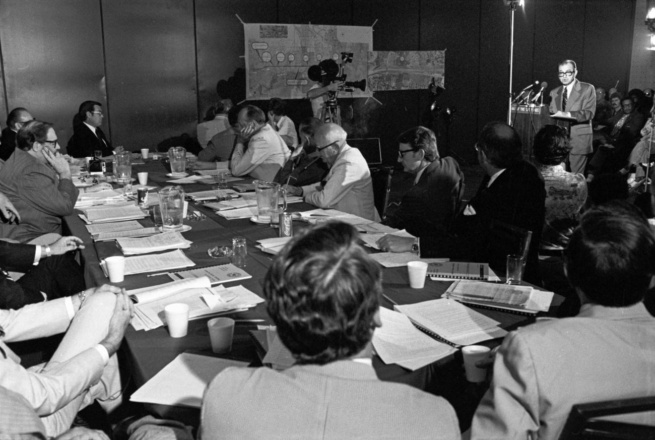 Tom Vandergriff speaking at Texas Turnpike Authority and Texas Highway Commission meeting, 1976