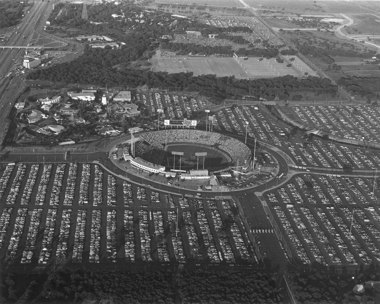 Aerial view of Arlington Stadium and parking lots, 1973