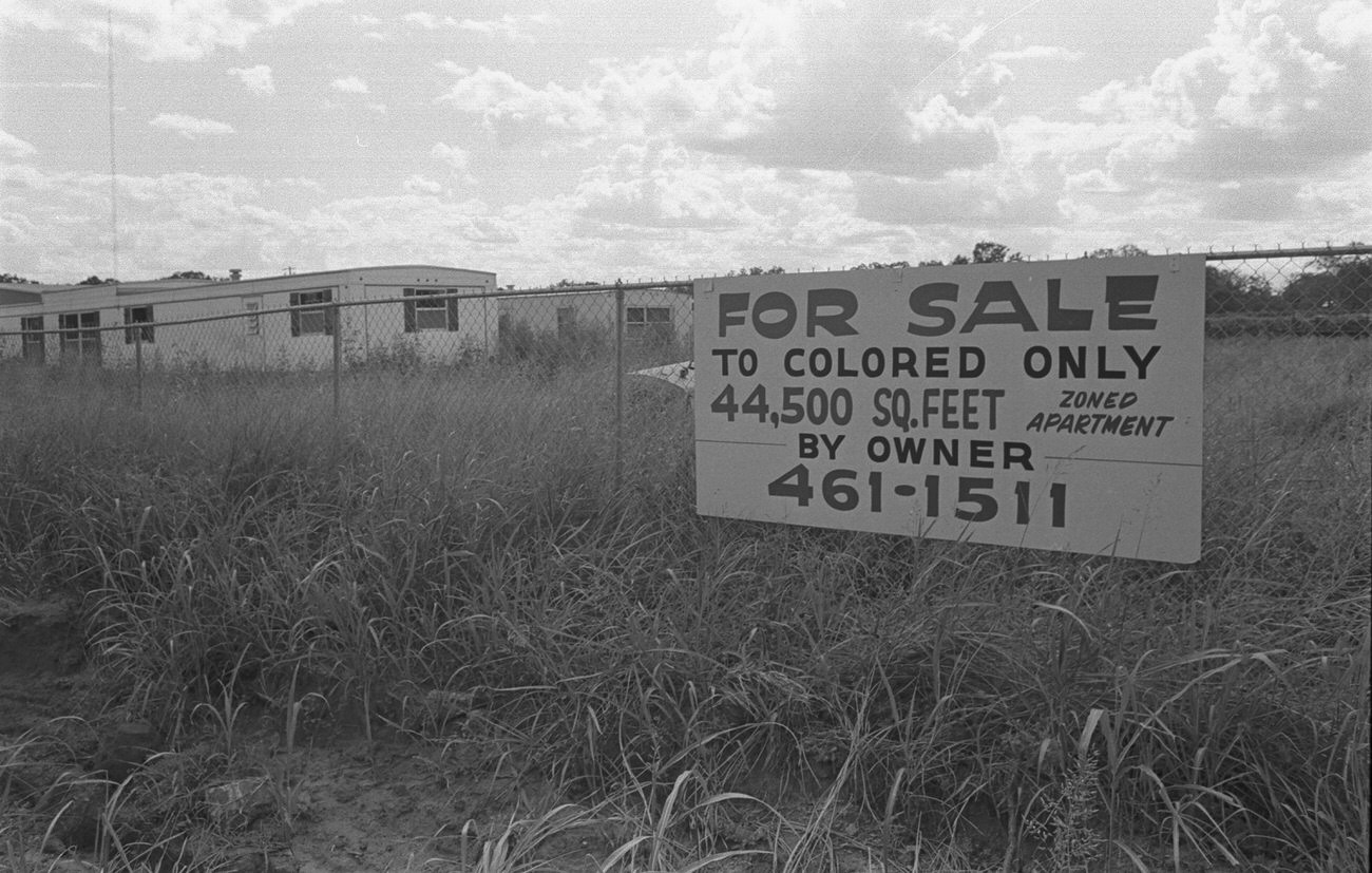 A sign in an Arlington field, 1975
