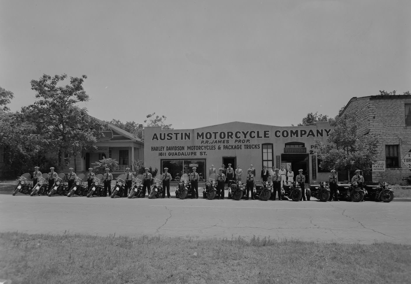 Austin Motorcycle Company with Police Men, 1953