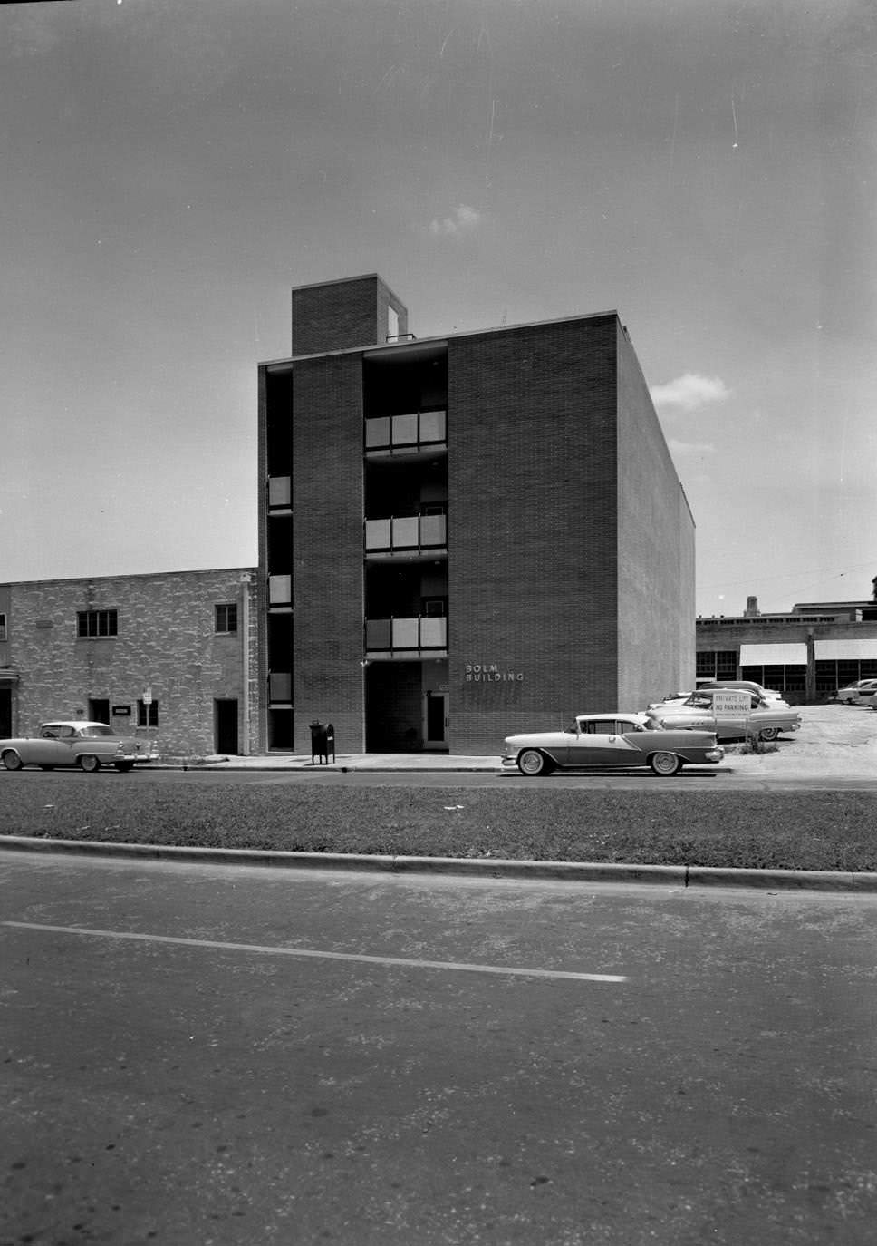 Exterior view of The Bolm Building at 308 W. 15th Street, 1956