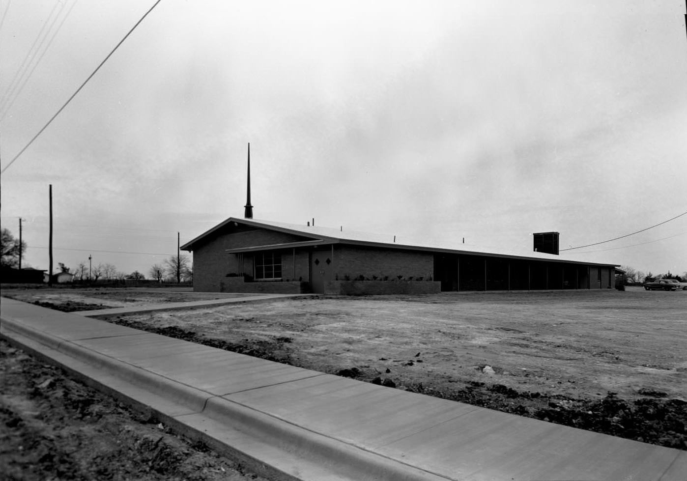 Exterior view of a Baptist Church in South Austin, 1957