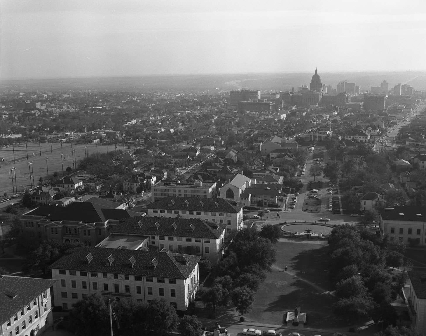 View looking south of UT Tower on South Mall, facing further on to Downtown Austin, 1958