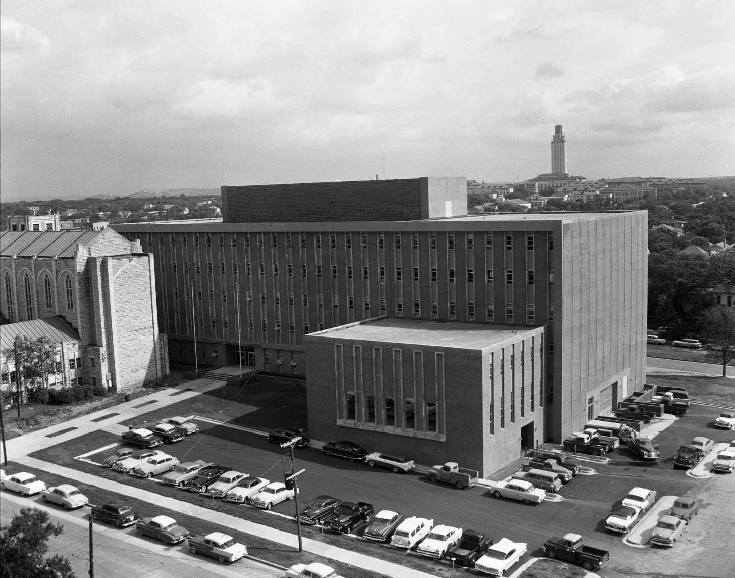 Aerial shot of finished TEC Building. Brazos St on the lower right and 14th on the lower left, 1958