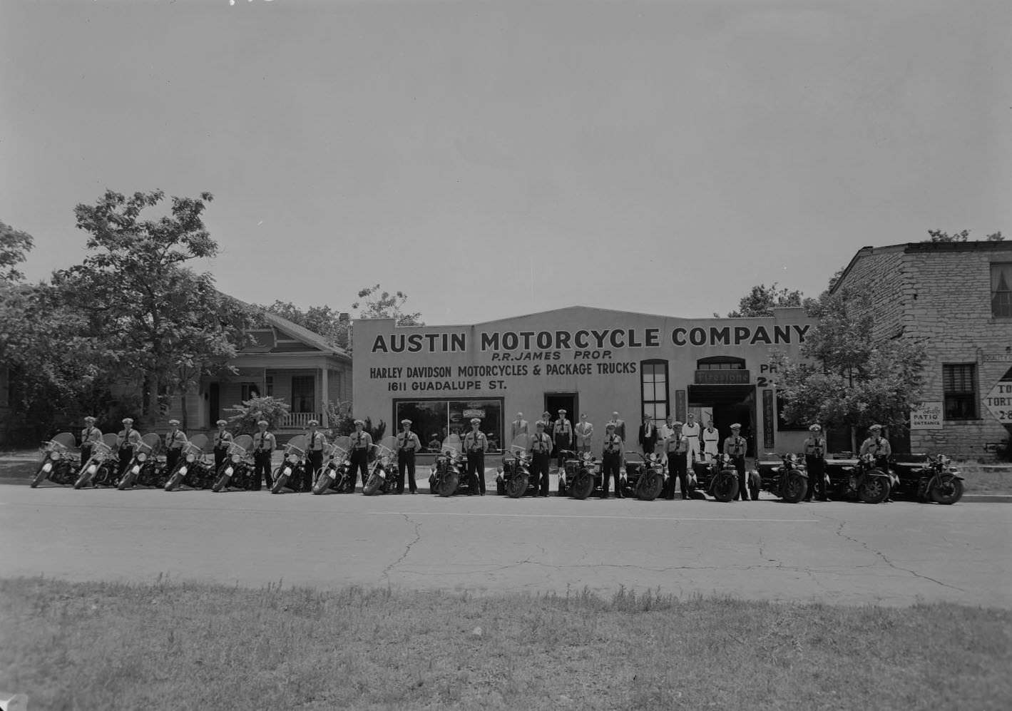 Austin Motorcycle Company with Police Men, 1953