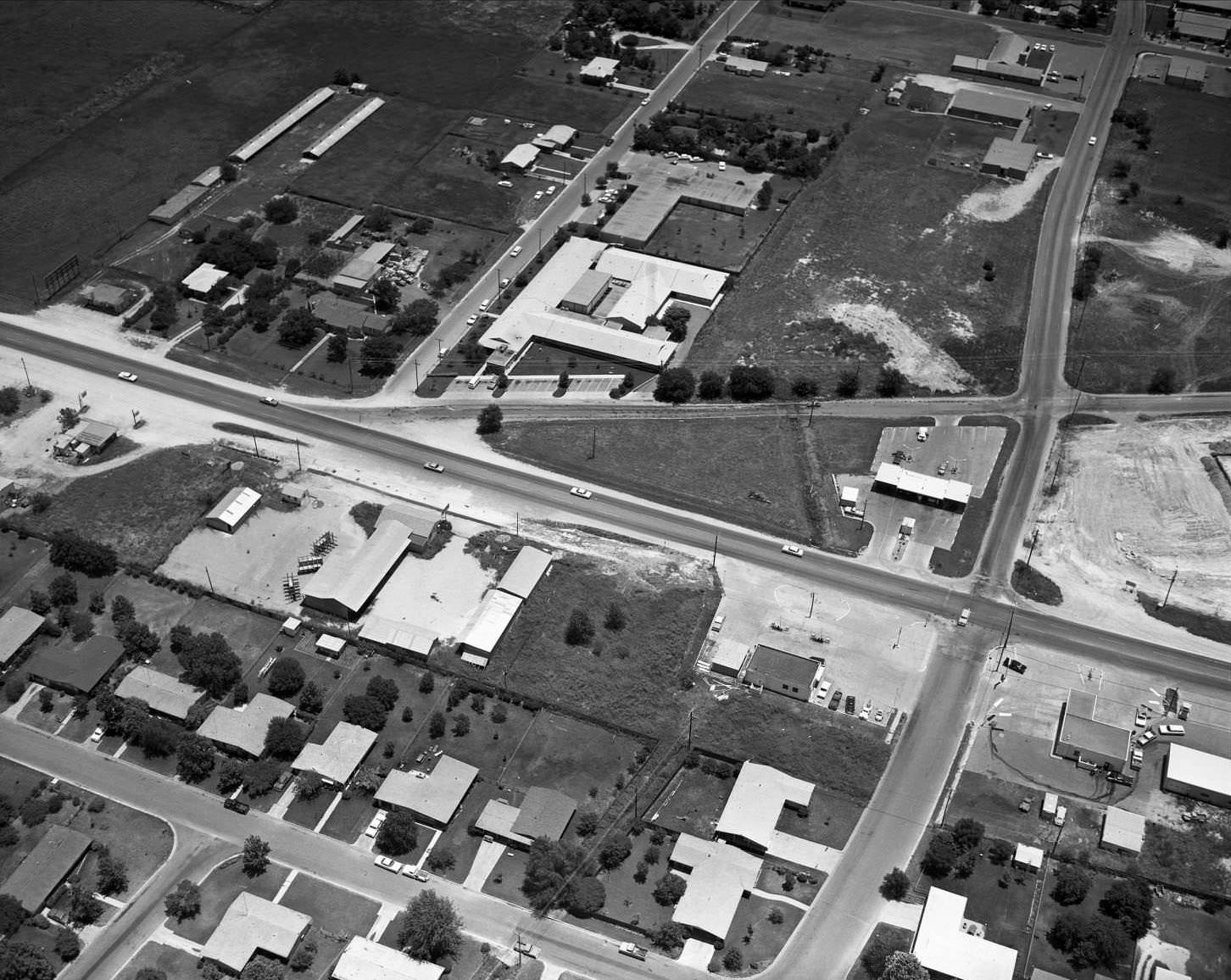 Aerial shot of CB Francis Rest Home, 6909 Burnet Rd. Burnet Road running left to right in center, 1965