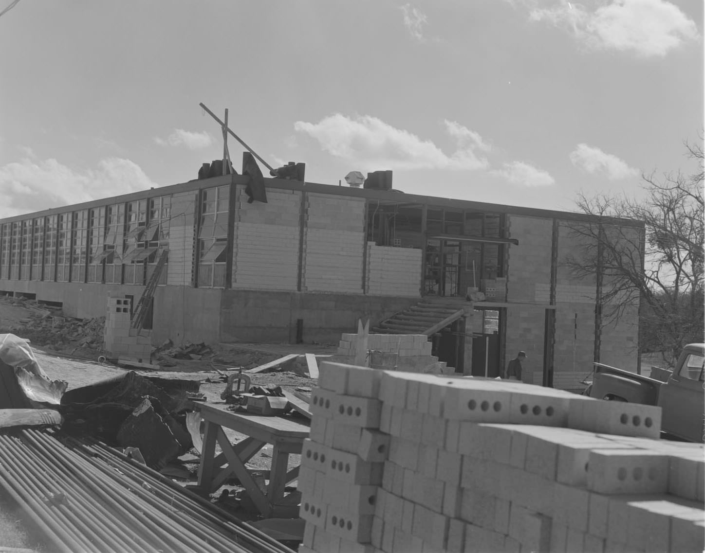 Bricks in front of the construction of Pearce Jr. High School, 1961